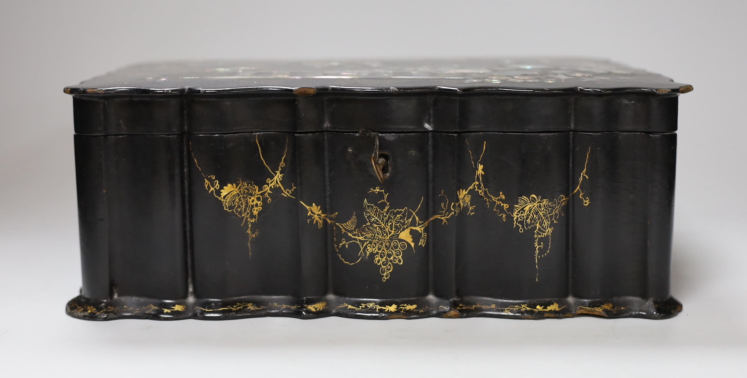 A Victorian papier mache workbox and contents, 32cm